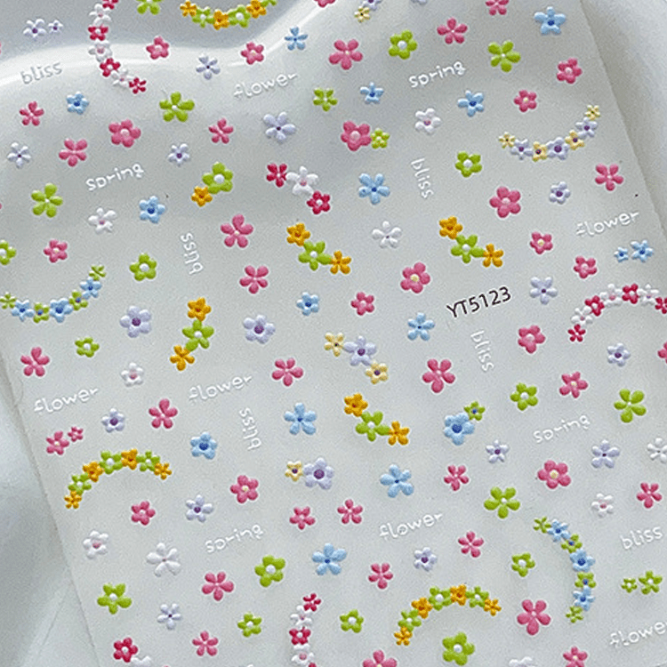 3D embossed mini floral nail stickers with charming cartoon blooms for DIY nail art