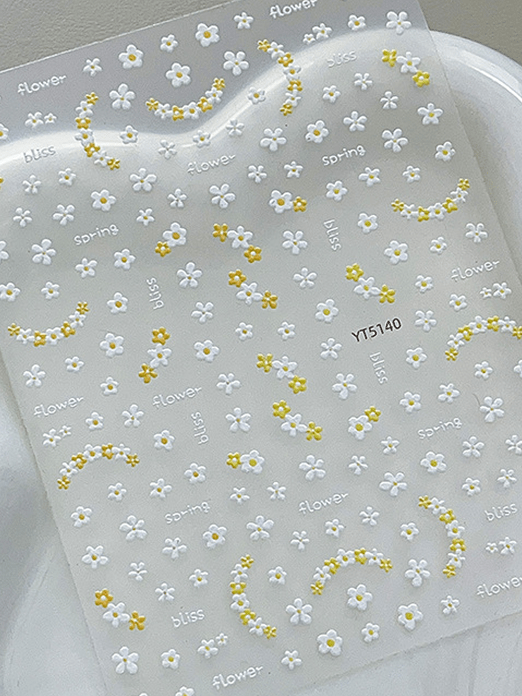 3D embossed mini floral nail stickers with charming cartoon yellow and white blooms for DIY nail art