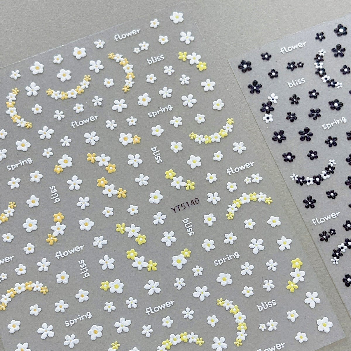 3D embossed mini floral nail stickers with charming cartoon blooms in yellow and black