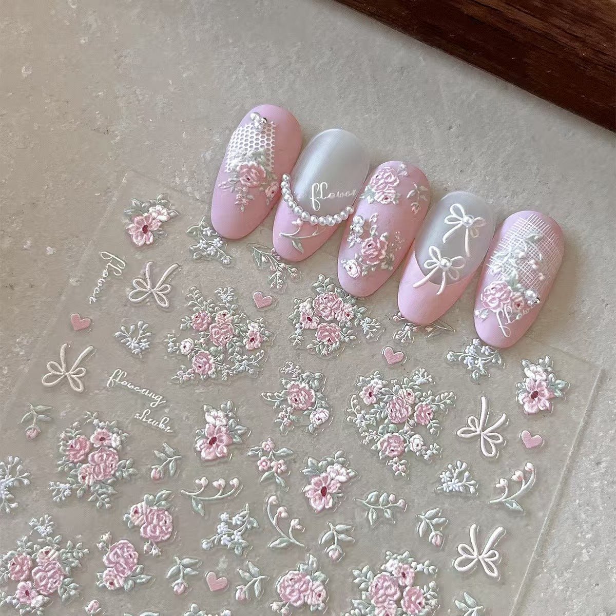 Blushing pink 3D embossed floral nail decals with green leaves for DIY nail art