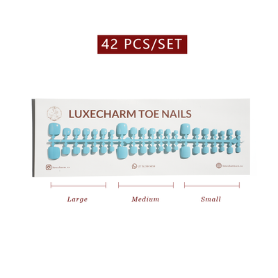 Packaging of LuxeCharm toenails with size labels on a white background. Cloudy press-on toenails 42 piece set — gray-beige neutral pedicure