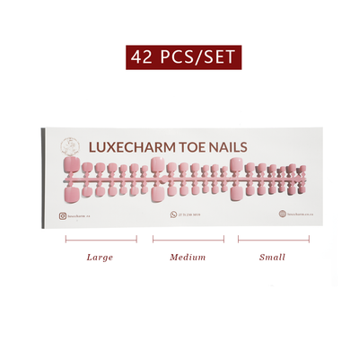 package of LuxeCharm toenails with product display and size labels on a white background. Cotton press-on toenails 42 piece set — off-white pedicure