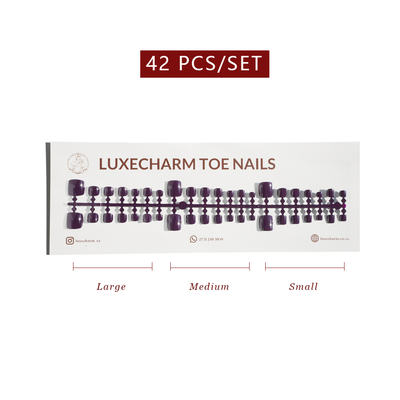 Packaging of LuxeCharm toe nails with size chart on a white background. Grape press-on toenails 42 piece set — deep berry pedicure