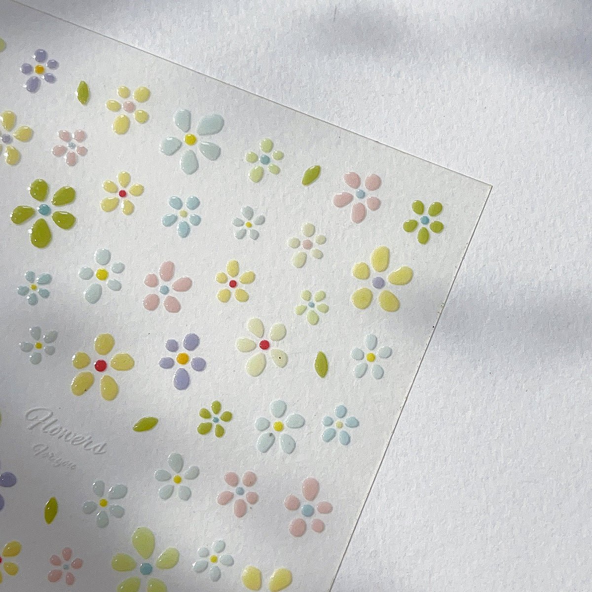Minimal cartoon bloom jelly flower 3D nail art sticker on press on nails, close up look angle 3