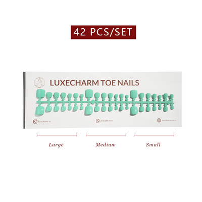 Packaging of LuxeCharm toenails with size labels on a white background. Mint press-on toenails 42 piece set — mint green pedicure