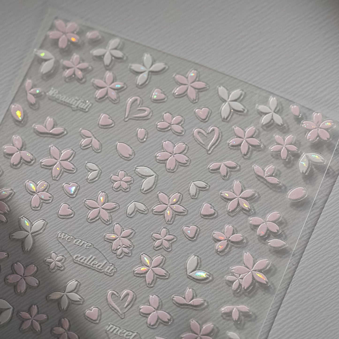 Sakura pink petal nail stickers with iridescent shell effect