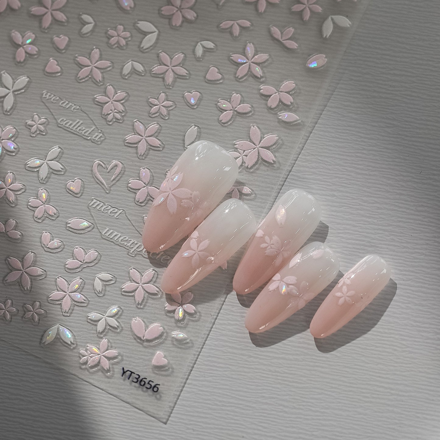 Sakura pink petal nail stickers with iridescent shell effect, on press on nails
