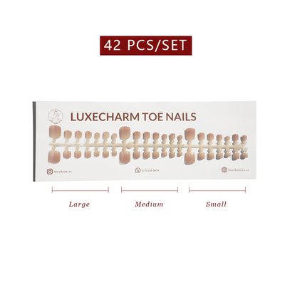 Packaging of LuxeCharm toe nails with size chart on a white background. Sand press-on toenails 42 piece set — warm nude pedicure