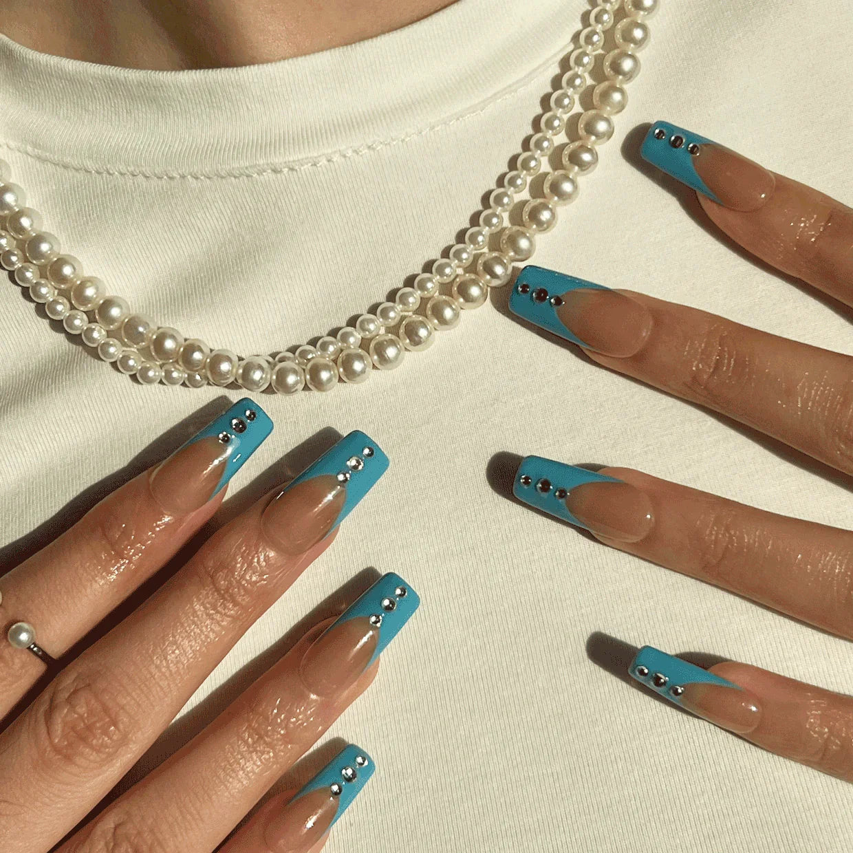 Sky blue gemstone French nails. Square nails. On-hand image. 8 press-ons.