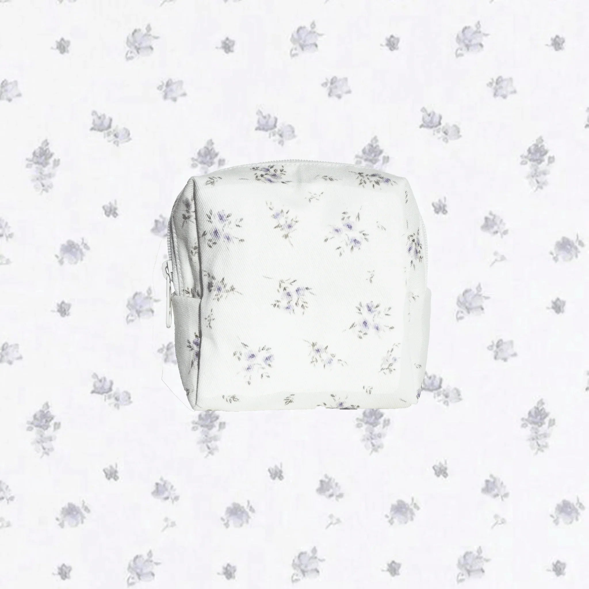 Handmade carry pouch with purple floral pattern on a white background. LuxeCharm