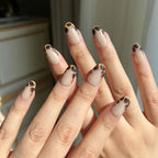 LuxeCharm Glazed Amber press-on nails worn on hand, featuring tortoiseshell pattern and a glazed finish