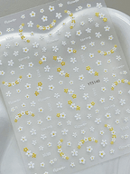 3D embossed mini floral nail stickers with charming cartoon yellow and white blooms for DIY nail art 