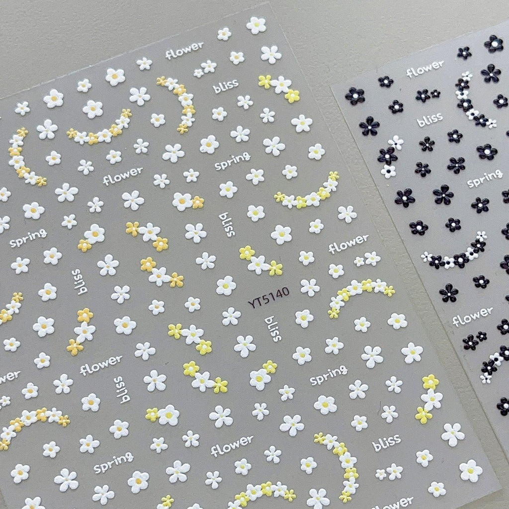 3D embossed mini floral nail stickers with charming cartoon blooms in yellow and black 