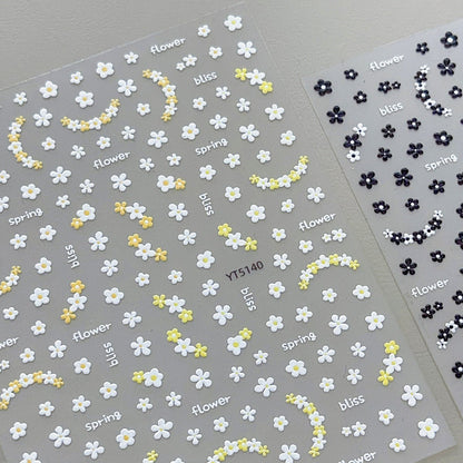 3D embossed mini floral nail stickers with charming cartoon blooms in yellow and black 