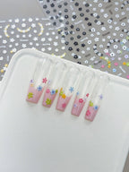 3D embossed mini floral nail stickers with charming cartoon blooms on press on nails, close up look