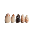 Set of five LuxeCharm press on nails featuring a milky nude base and soft brown deer-print tips  on a white background