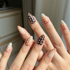 LuxeCharm Bambi Haze nails on hand with short almond shape and subtle animal print detailing