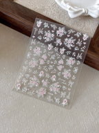 Blushing pink 3D embossed floral nail decals with green leaves