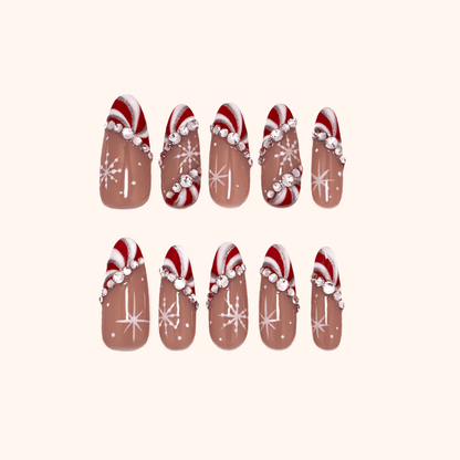 holiday and Christmas press on nails-Ten press-ons- rhinestones gems, snowflakes, and candy cane design 