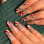 Christmas press on nails on hand. Close up. Holiday vibe 