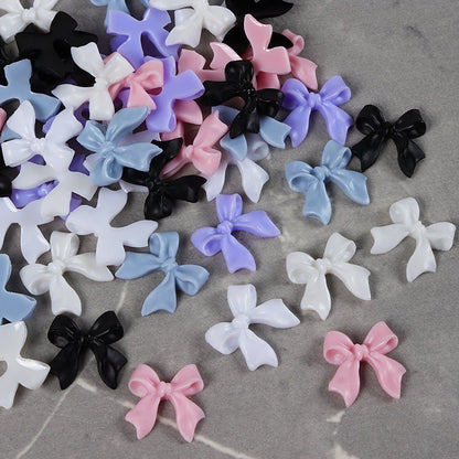 Multicolored 3D resin bow-knot nail charms (11mm) Close up look, Display