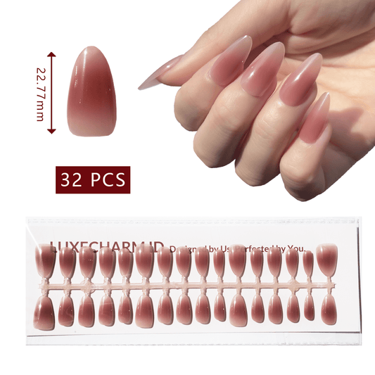 LuxeTip Blush Ombre press on nails medium almond, on hand display, thumb nail size 