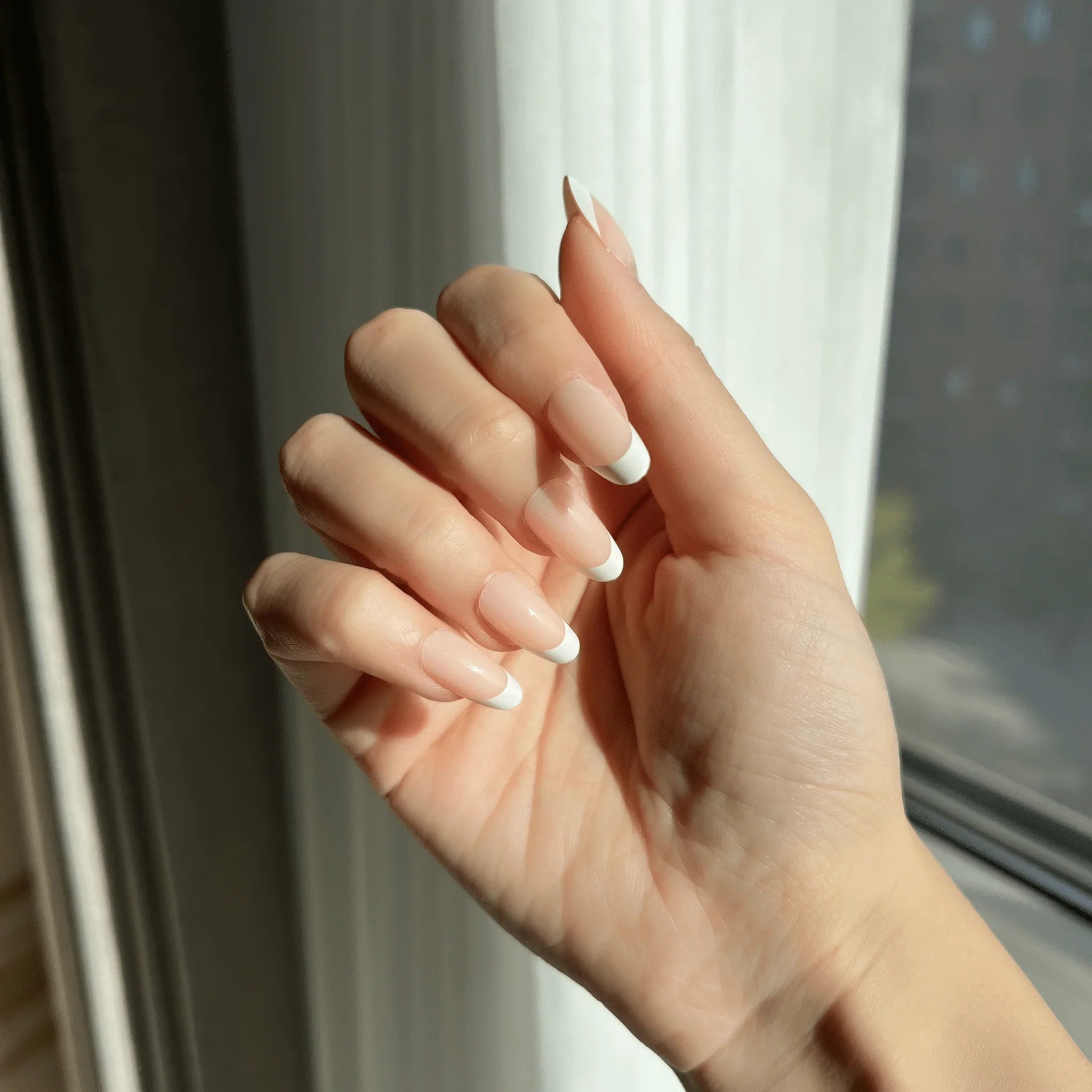 LuxeTip French Press On Nails, Short Oval White French Tips, High-Gloss Finish, On Hand Display 3