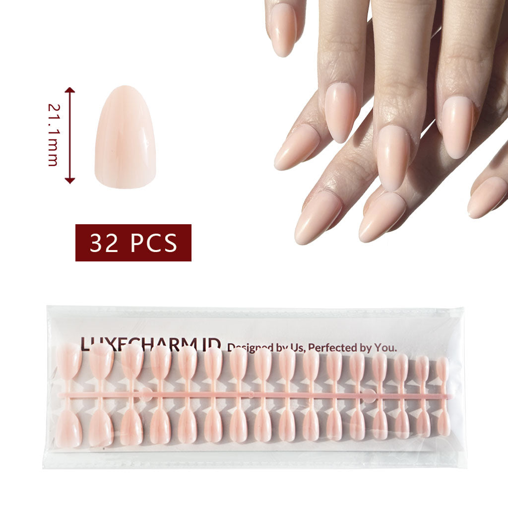 Packaging of LuxeCharm Blush Petal press-on nails extensions with a hand displaying nails painted with the same color. 32 Pieces