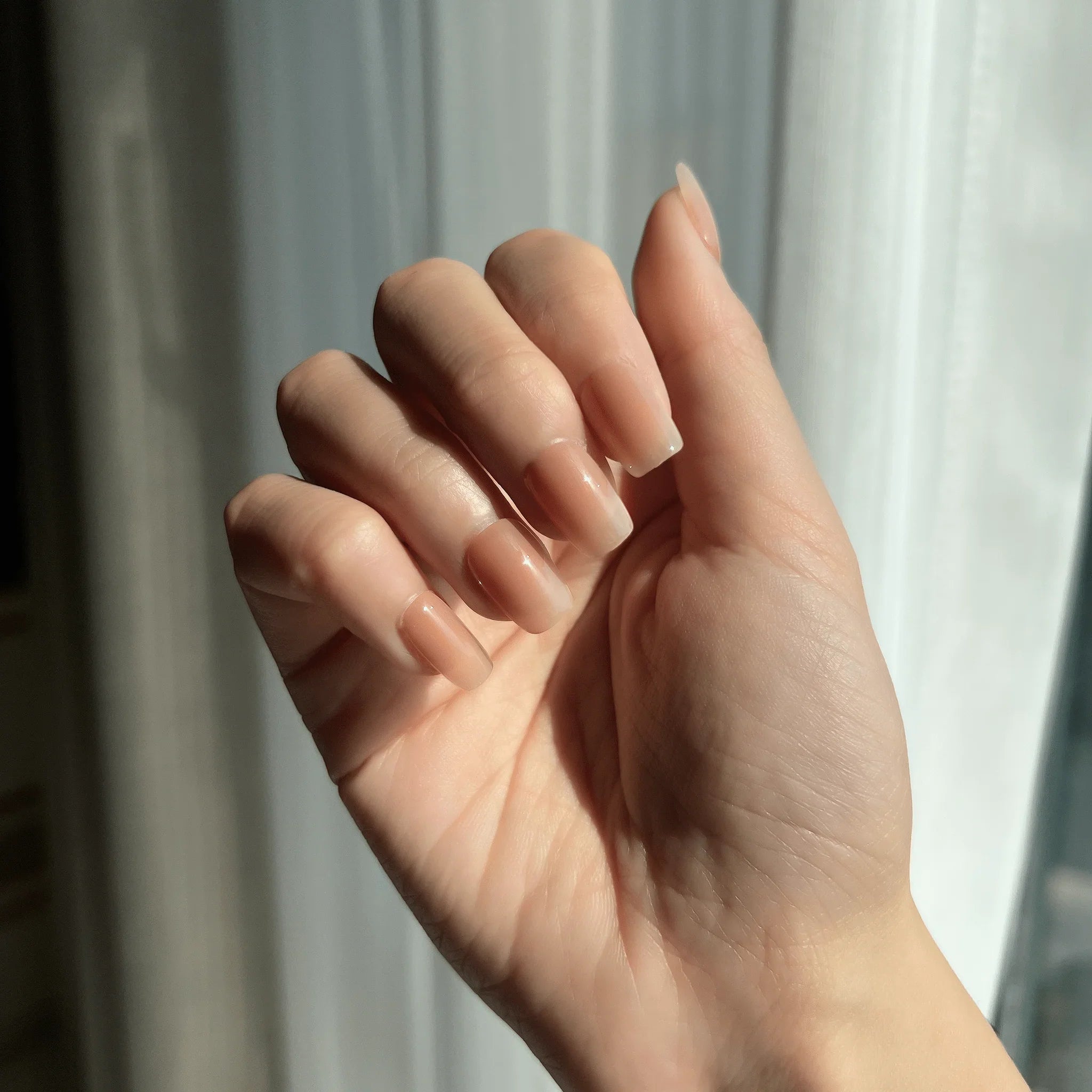 LuxeTip nude beige ombré press-on nails extra short square on hand display 2