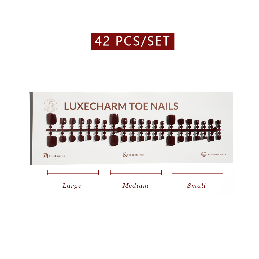 Display of LuxeCharm toe nails with size labels on a white background. Mocha press-on toenails 42 piece set — warm brown pedicure