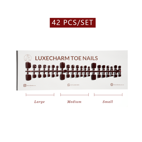 Display of LuxeCharm toe nails with size labels on a white background. Mocha press-on toenails 42 piece set — warm brown pedicure