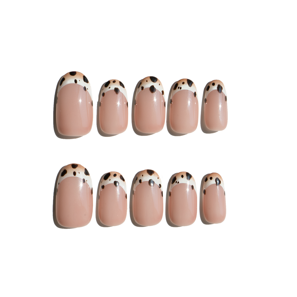 Set of ten Luxecharm press-on nails featuring mocha polka dot designs on a white background