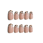 Set of ten Luxecharm press-on nails featuring mocha polka dot designs on a white background