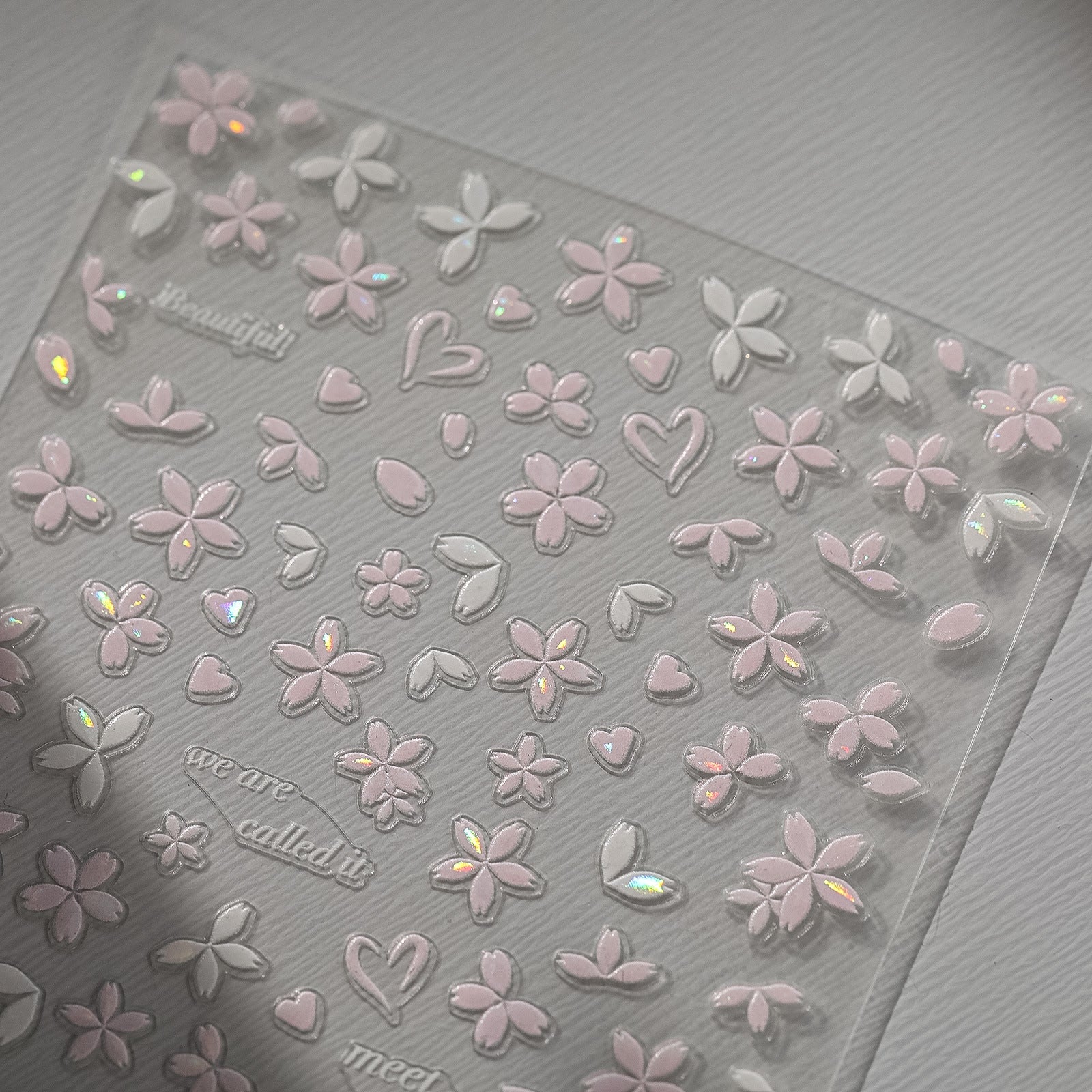 Sakura pink petal nail stickers with iridescent shell effect 