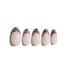 Set of five LuxeCharm press on nails featuring dusty pink tones and a small 3D bow accent on a white background