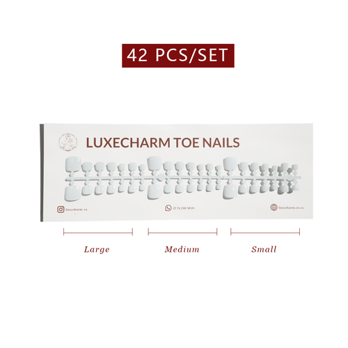 Set of LuxeCharm toe nails with size labels on a white background. White press-on toenails 42 piece set — crisp white pedicure